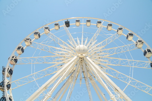 ferris wheel with blue sky background