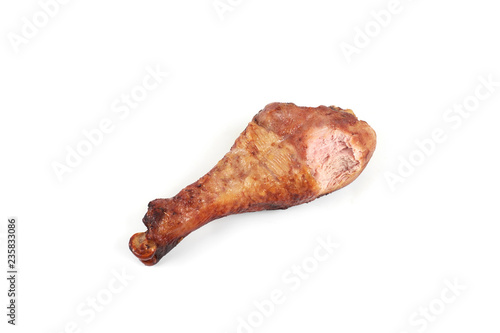 roasted turkey leg with bite taken, isolated on white background.