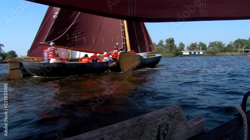 sailing with classic boats on inhore water Friesland The Netherlands photo