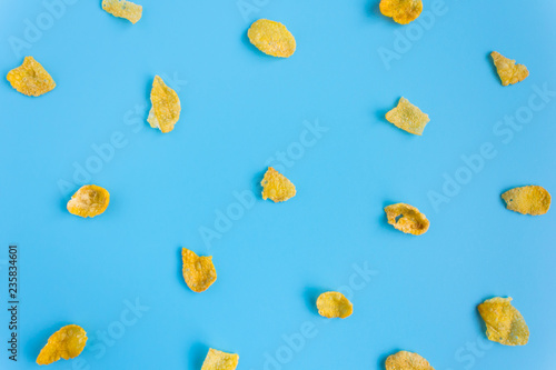 Photos Cornflakes on Blue Pastel Background Minimalist