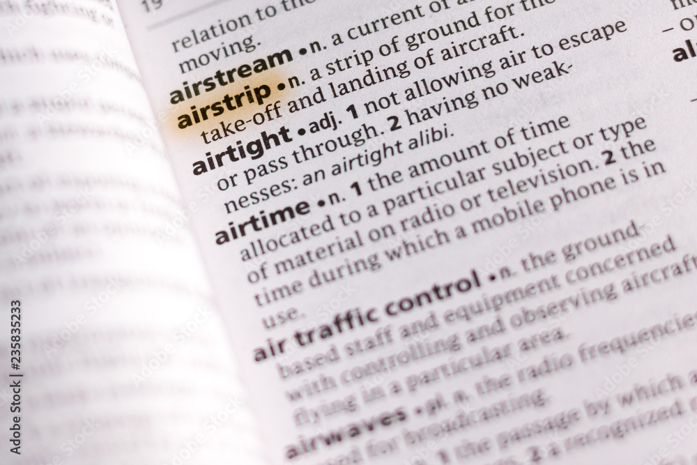The word or phrase Airstrip in a dictionary. The word or phrase Airstrip in a dictionary.
