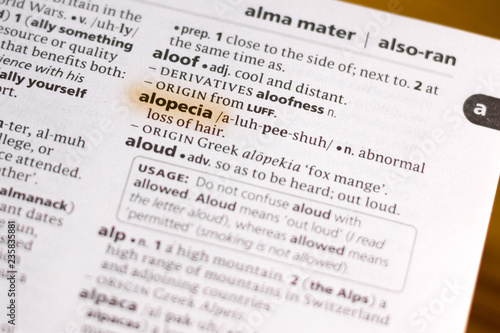 The word or phrase Alopecia in a dictionary. © sharafmaksumov