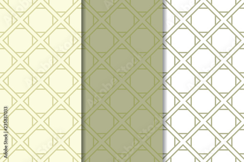 Set of geometric ornaments. Olive green and white seamless patterns