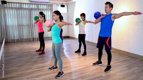 people strength body with kettlebells opening arm