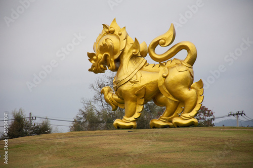 Gold Singha statue on hill in Singha Park at Chiangrai city in Chiang Rai  Thailand