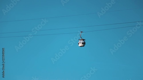 Cabins of funicular on the sky background. photo