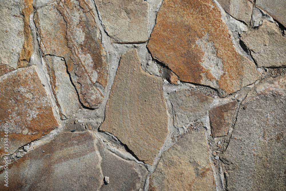 Fototapeta premium The texture of the stones. Stone textured tile. Stone pattern on the tile.