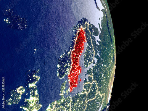 Satellite view of Sweden at night with visible bright city lights. Extremely fine detail of the plastic planet surface.
