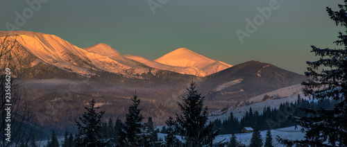 Morning light in winter mountains