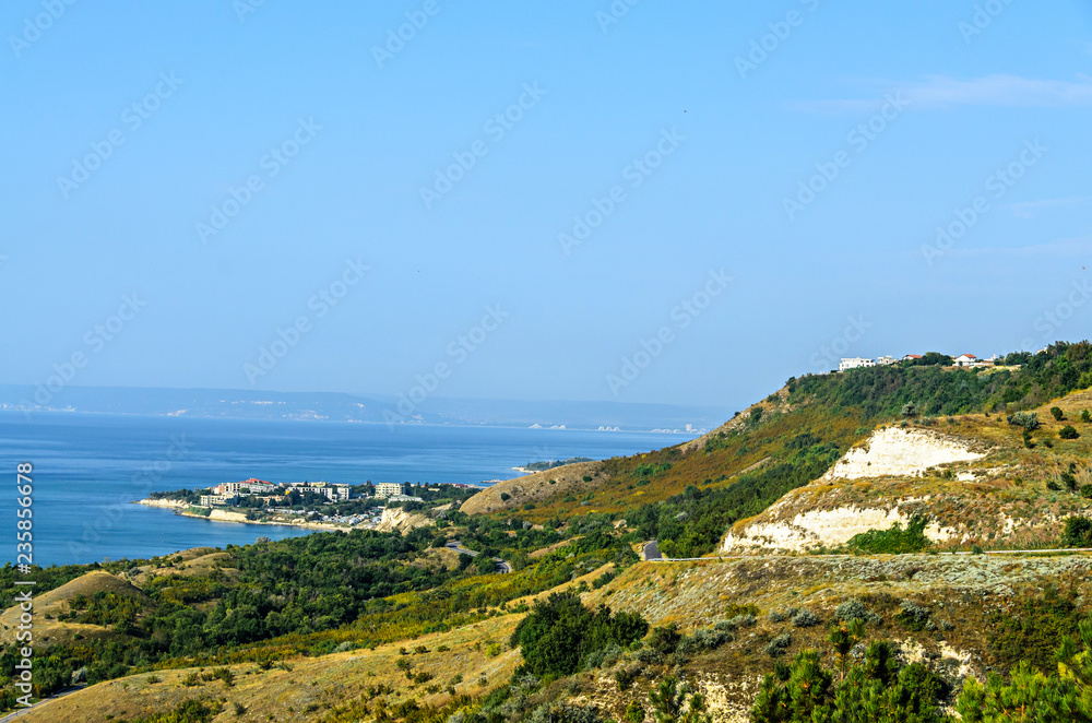 Green Thracian cliffs near blue clear water of Black Sea, rocky path seaview Green Thracian cliffs near blue clear water of Black Sea, rocky path seaview