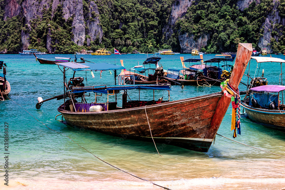 Longboat docked on the shores of Phi Phi Island