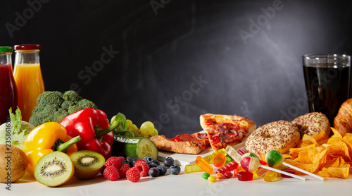 Healthy vs unhealthy foods with copy space