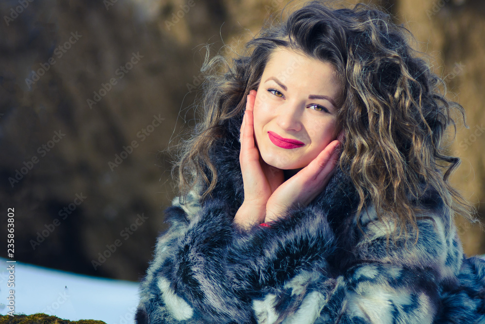 pretty young girl with curtains in winter in gray coat pretty young girl with curtains in winter in gray coat