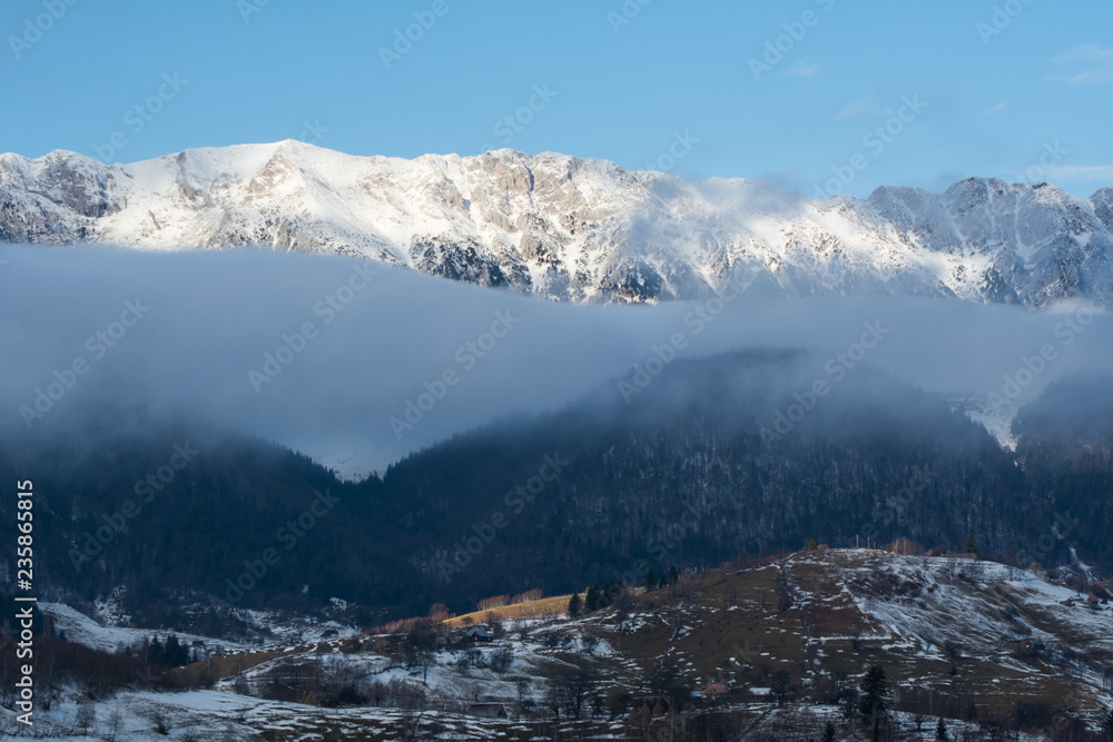Foggy mountain landscape in winter