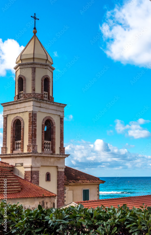 Old Church Steeple in a Village along the southern Italian Mediterranean Coast