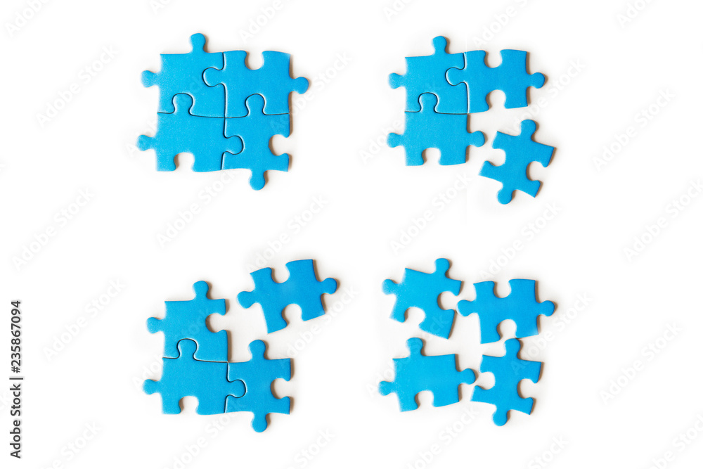Blue puzzles on white background. Set of blue puzzles. Isolated on white. Business and education