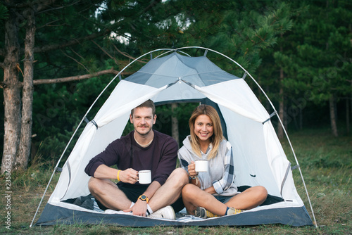 Young couple camping in mountain 