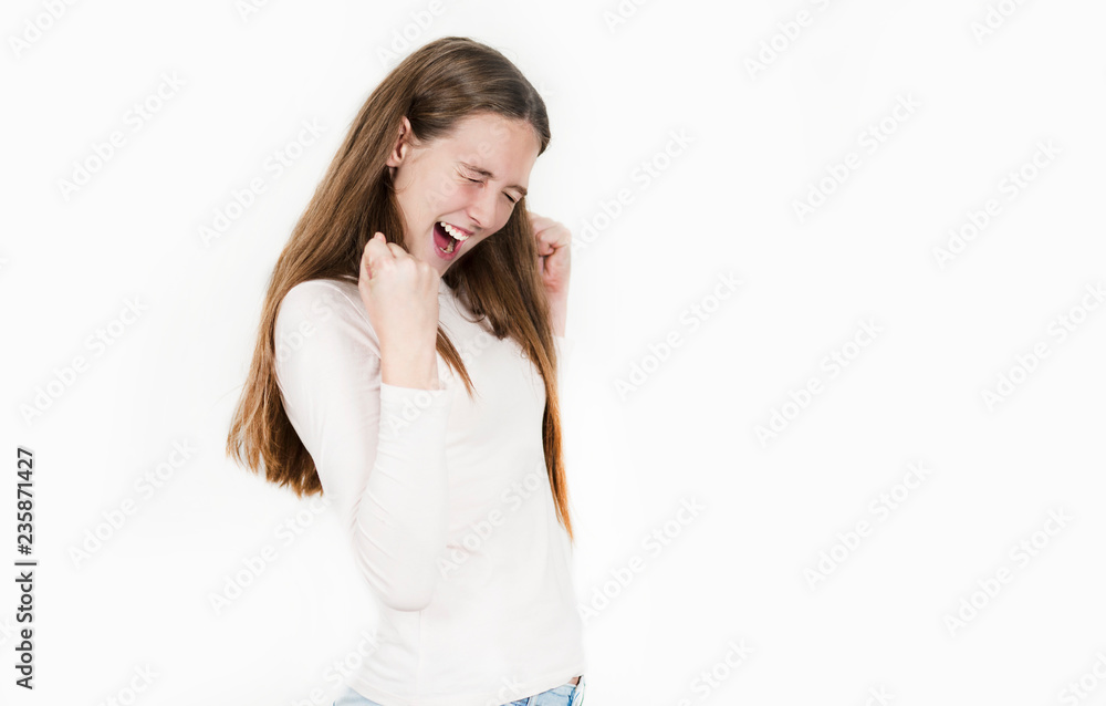 Bright beautiful girl emotionally posing on an isolated background. Bright beautiful girl emotionally posing on an isolated background.