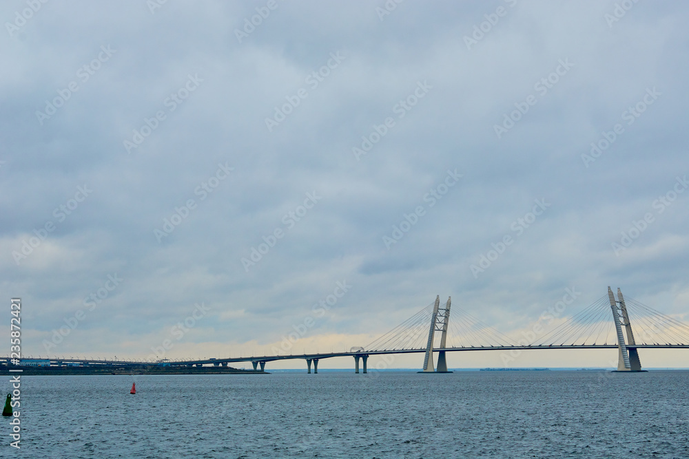 bridge over the river in cloudy weather