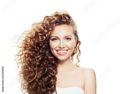 Bilde på lerret Happy smiling girl with healthy skin and perfect wavy hair isolated on white
