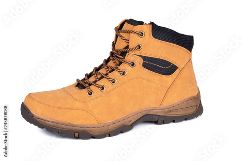 One brown leather hiking boot or shoe isolated on white background.