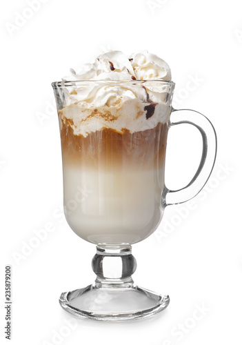 Cold coffee covered with whipped cream and chocolate in glass on white background