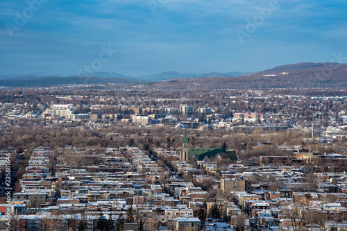 Quebec lower town with Laurentian Mountains in the background in winter