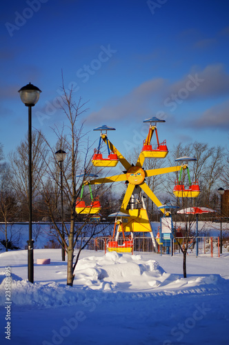 summer roundabout in winter furniture in the amusement park