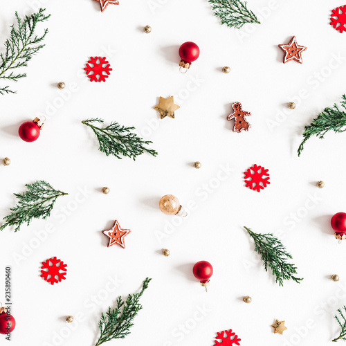 Christmas composition. Fir tree branches, decorations on white background. Christmas, winter, new year concept. Flat lay, top view, square