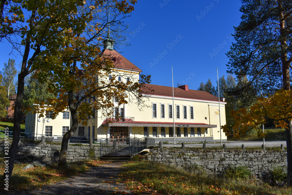 Yellow European building during autumn Yellow European building during autumn