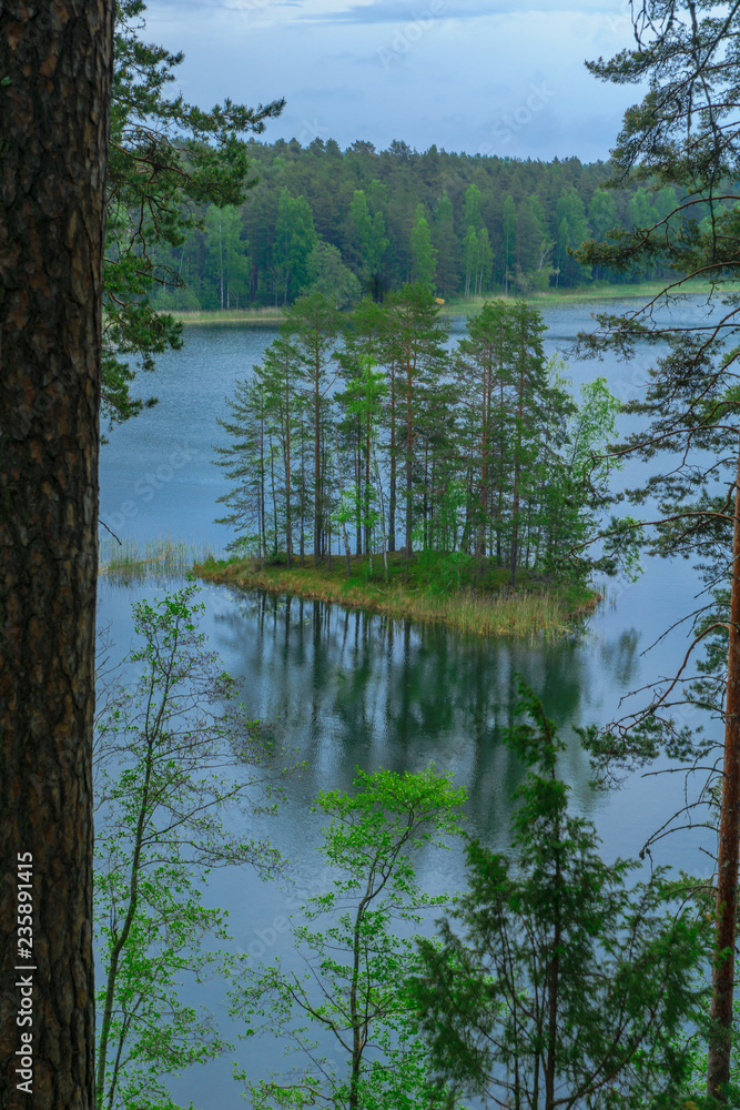 Obraz premium Landscape of lakes and forest along the Punkaharju ridge