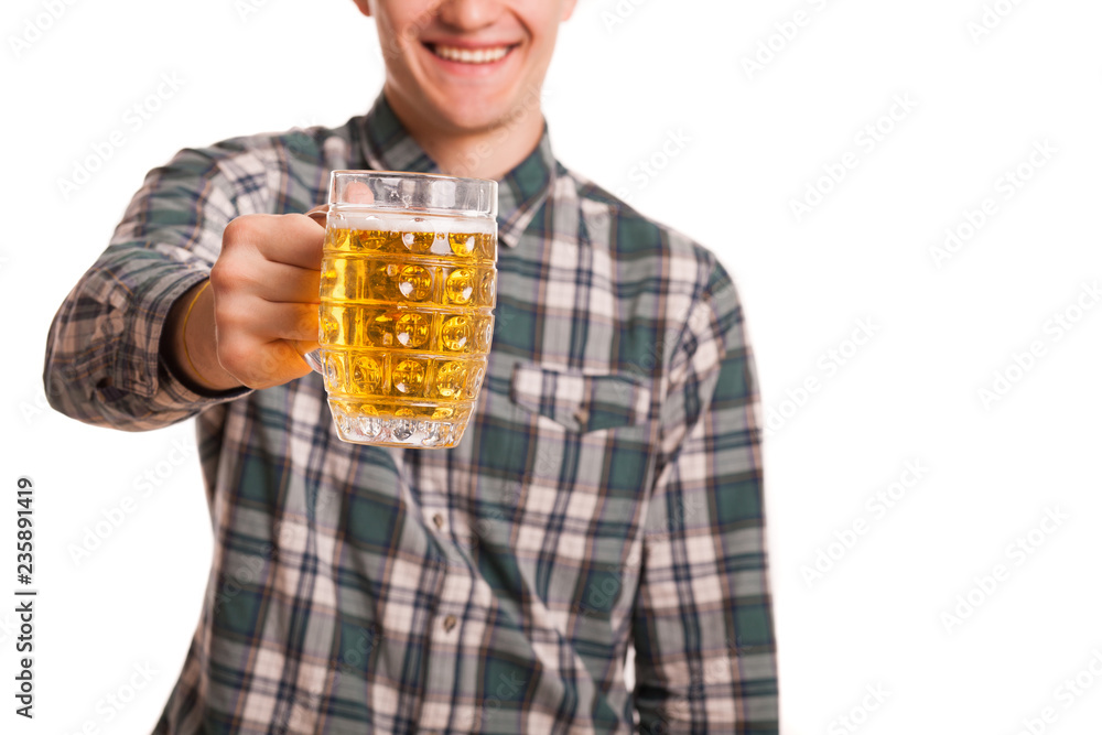 Cropped studio shot of a happy man smiling joyfully holding out glass of beer to the camera, isolated on white. Cheerful male posing with a glass of tasty cool beer, copy space on the side Cropped studio shot of a happy man smiling joyfully holding out glass of beer to the camera, isolated on white. Cheerful male posing with a glass of tasty cool beer, copy space on the side