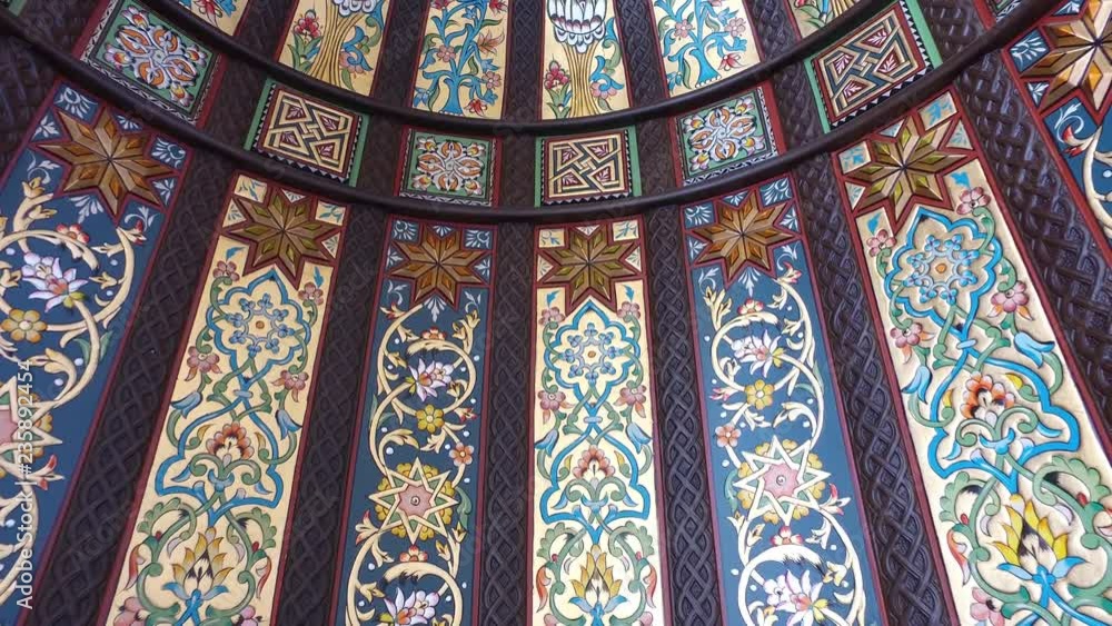 The colorful pattern of the minbar. The wooden minbar in the mosque ...
