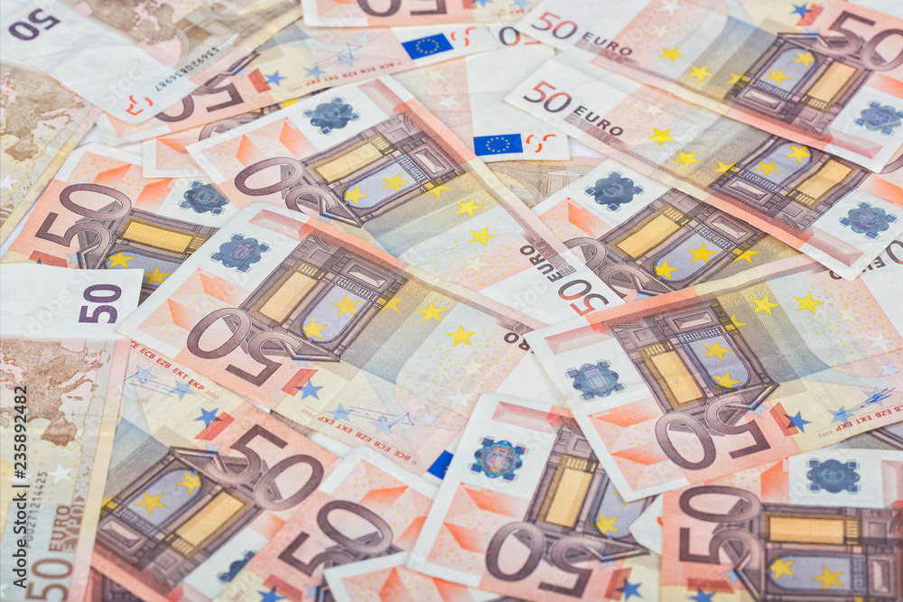 Fullscreen piled up 50 euro bills 