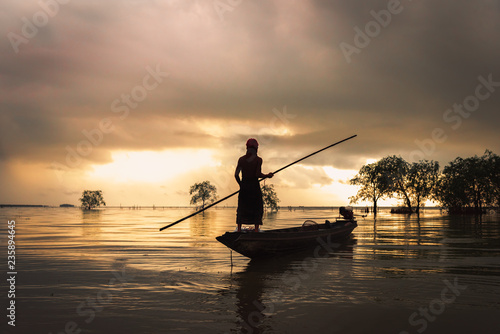 Landscape of Thai fisherman with net fish trap in Southern Thailand. © May_Chanikran