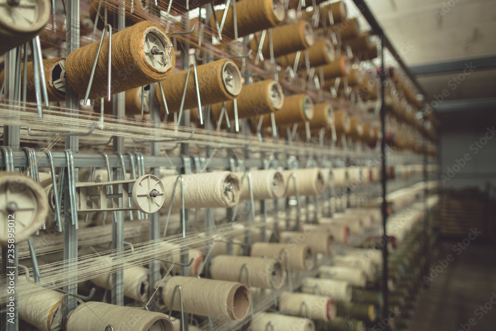 Clothing industry, canvas textile material fabric factory. wire fabric factory for textile material or clothing cloth machine production thread. sewing production machinery garment