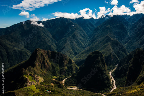 Putucusi and Urubamba River as seen from Machu Picchu Mountain photo