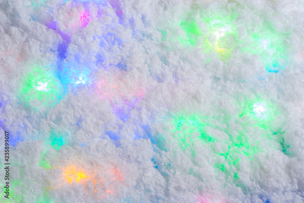 Christmas abstract background with snow and a garland.