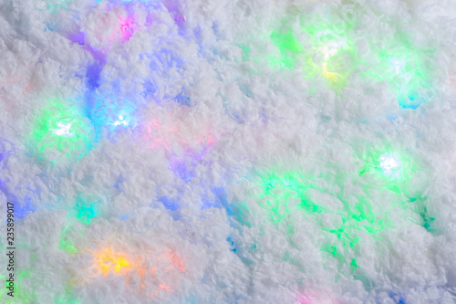 Christmas abstract background with snow and a garland.