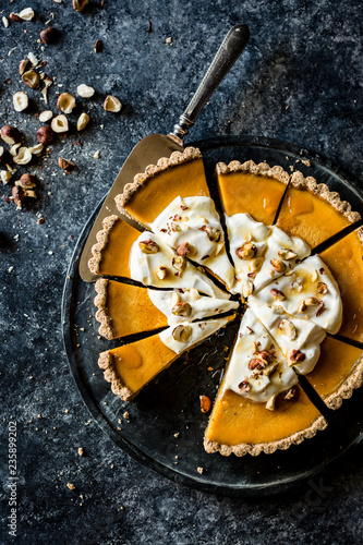 Overhead view of pumpkin cream pie served on plate