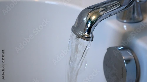 Bathtub fills from a running tap