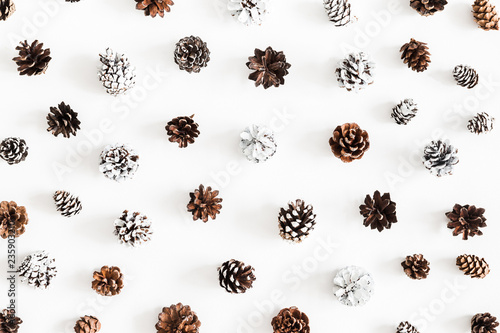Christmas composition. Pattern made of pine cones on white background. Christmas, winter, new year concept. Flat lay, top view