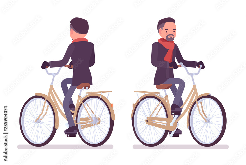 Stylish middle aged man in autumn wear riding city bike Stylish middle aged man in autumn wear riding city bike