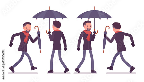 Stylish middle aged man with umbrella walking and running