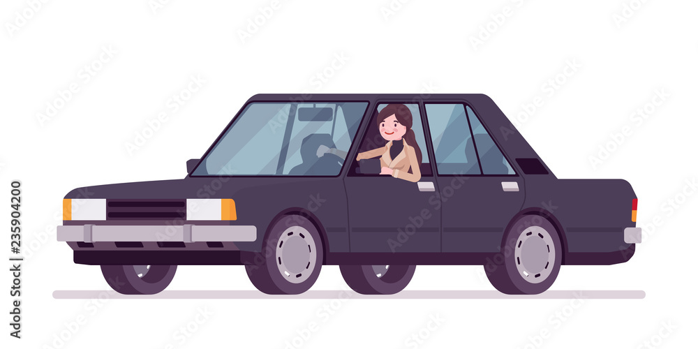 Woman in autumn wear driving a car