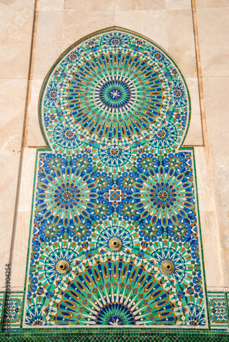 Fountain detail with colorful mosaics at Hassan II Mosque is the largest mosque in Casablanca, Morocco and one of the most beautiful. 13th largest in the world