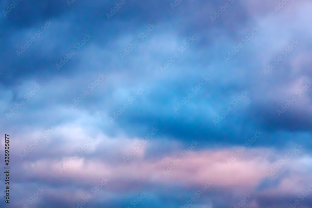 Colored cloudy sky background. The skies are lit up in the sun.