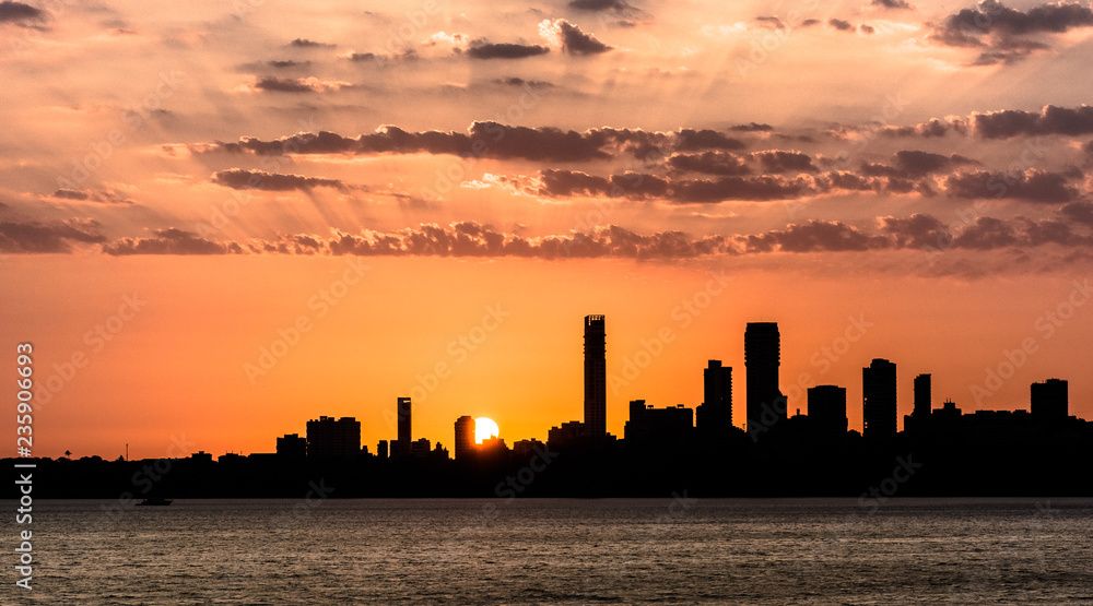 Silhouette of skyline of Mumbai or Bombay during sunset