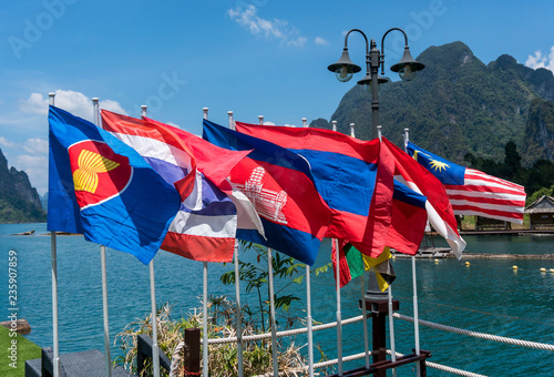 Obraz na płótnie View of national flags of Southeast Asia countries. Brunei Darussalam, Myanmar Burma, Cambodia, Indonesia, Laos, Malaysia, Philippines, Singapore, Thailand, Vietnam, East Timor. Nature background w salonie