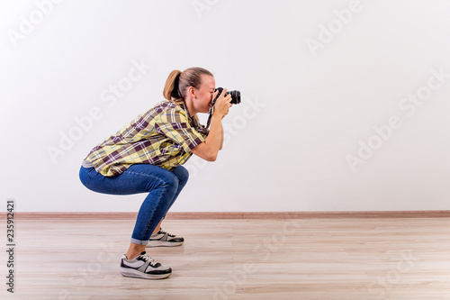 different photographer poses: bending, squatting, lying down
